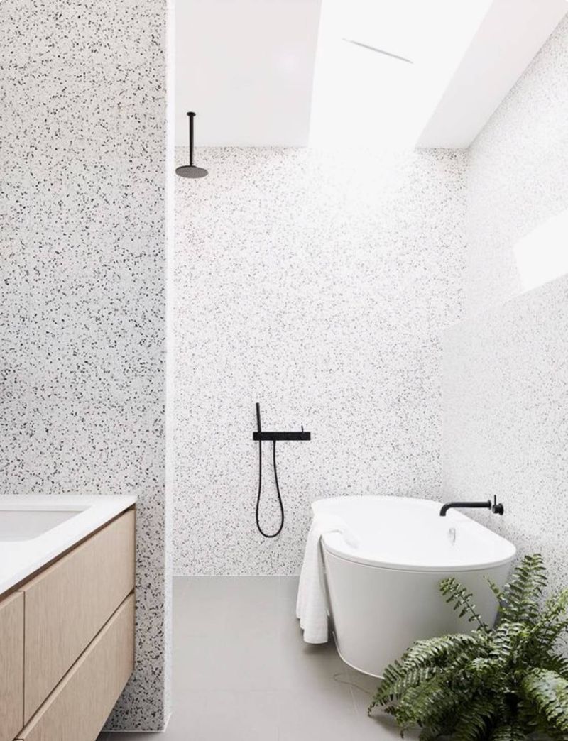Salle de bains avec murs en terrazzo granito très contemporaine et branchée!